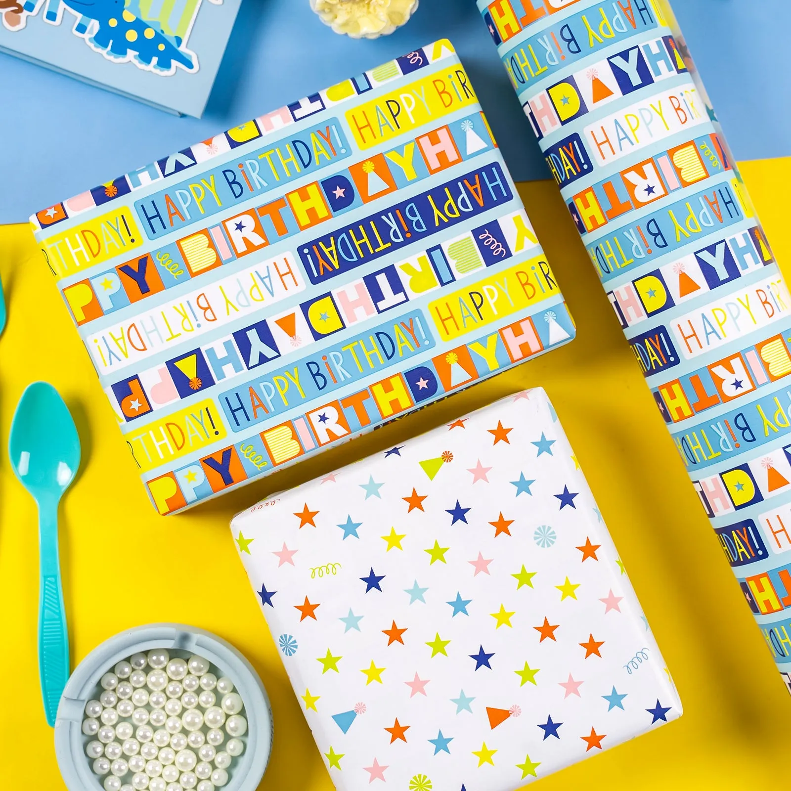 Birthday Lettering Wrapping Paper with Colorful Stars on Reverse